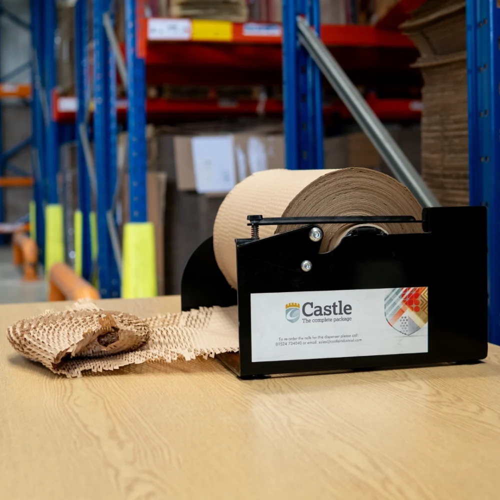 Hexcel paper dispenser on top of a workbench.