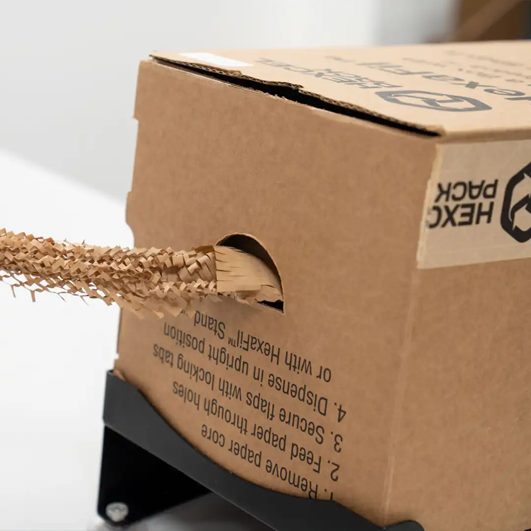 Hexafil Pulling close up of Hexafil being pulled out of the dispenser box