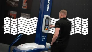 Load Stability Consultant reviewing pallet wrapper settings