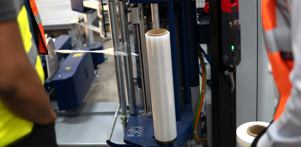 close up of pallet wrap reeling off the machine pallet wrapper carriage