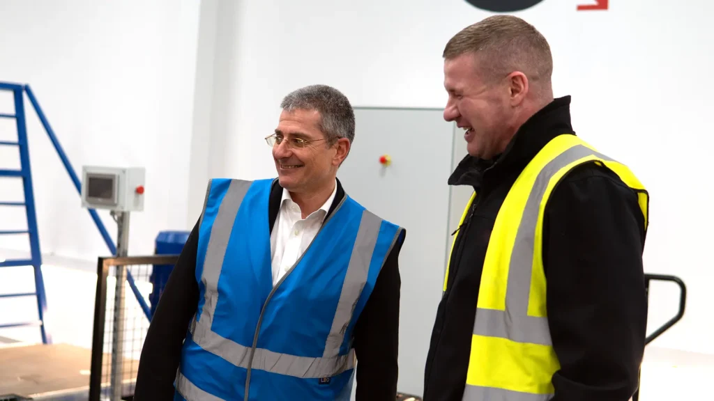 Ben laughing with a visitor in Test Centre
